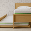 A lifestyle render of the Helix Trundle Mattress in a bedroom scene