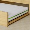 A lifestyle render of the Helix Trundle Mattress in a bedroom scene