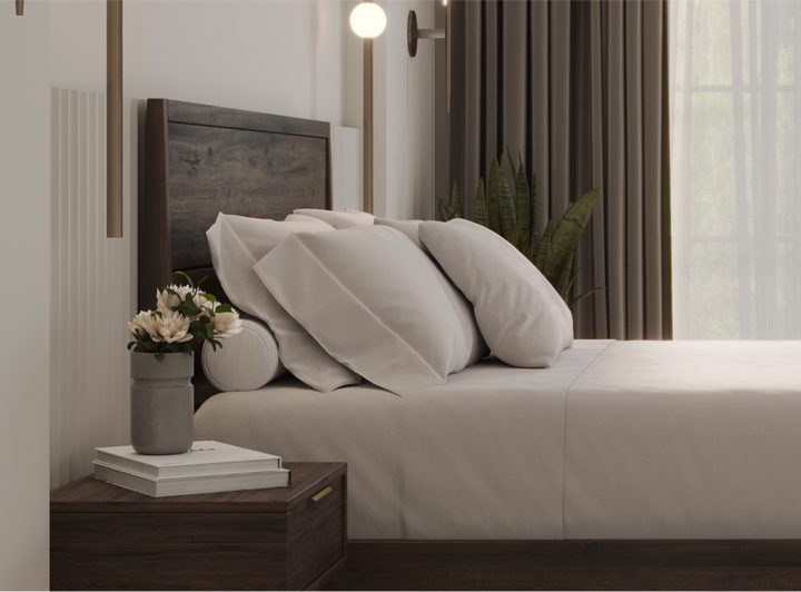 A closeup image of the Ludlow Bed Frame and Nightstand in a bedroom scene