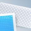 An image of the GlacioTex Cooling Pillow with a cutaway to show its cooling grid core.
