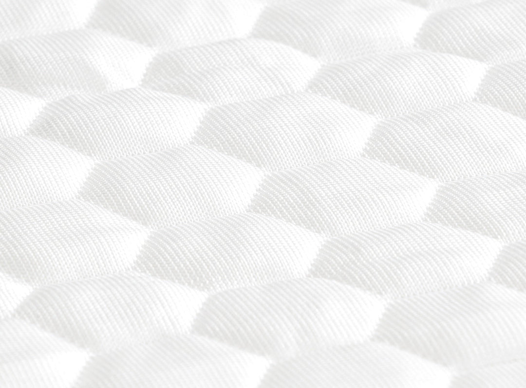 A closeup of the GlacioTex Mattress Protector showing cooling fabric 
