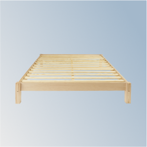 Wooden bed frame on a light blue background