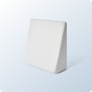 An image of the Wedge Pillow on a blue background gradient image