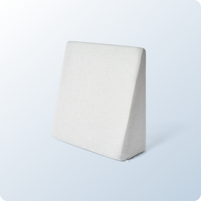 An image of the Wedge Pillow on a blue background gradient